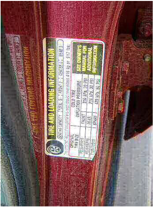 Vehicle Manufacturer specifications in the drivers door jamb of a vehicle. This indicates that the tires for this vehicle should be inflated to 30 PSI, except the spare which is 60 PSI. 